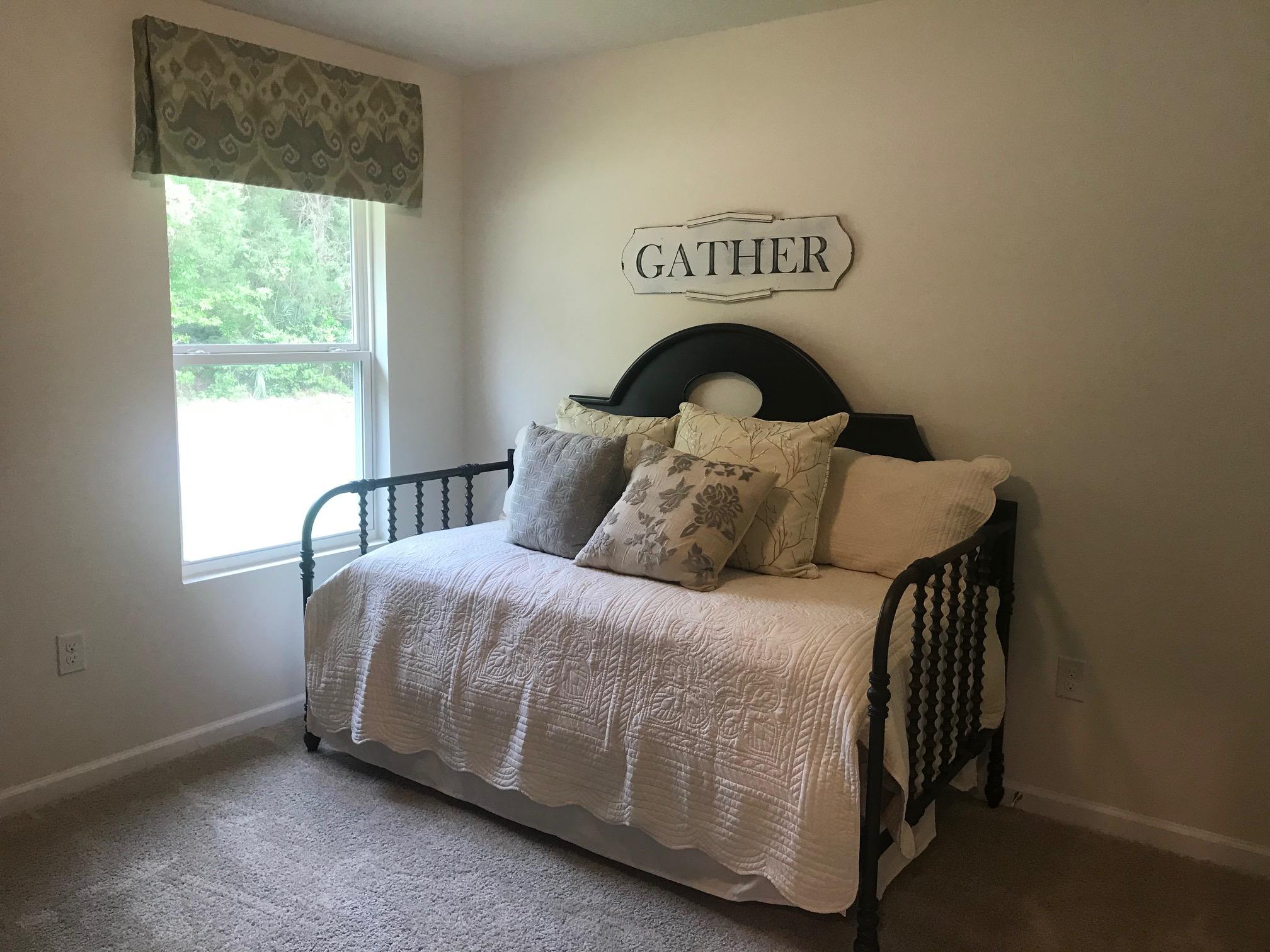 3582 Sugar Maple Lane Crestview, FL 32539 - Photo 13 of 20 a bedroom with a bed and a window