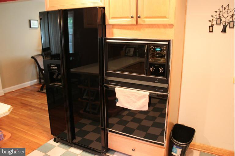 6904 Highland Street Springfield, VA 22150 - Photo 11 of 17 Large fridge with built in micro and wall oven