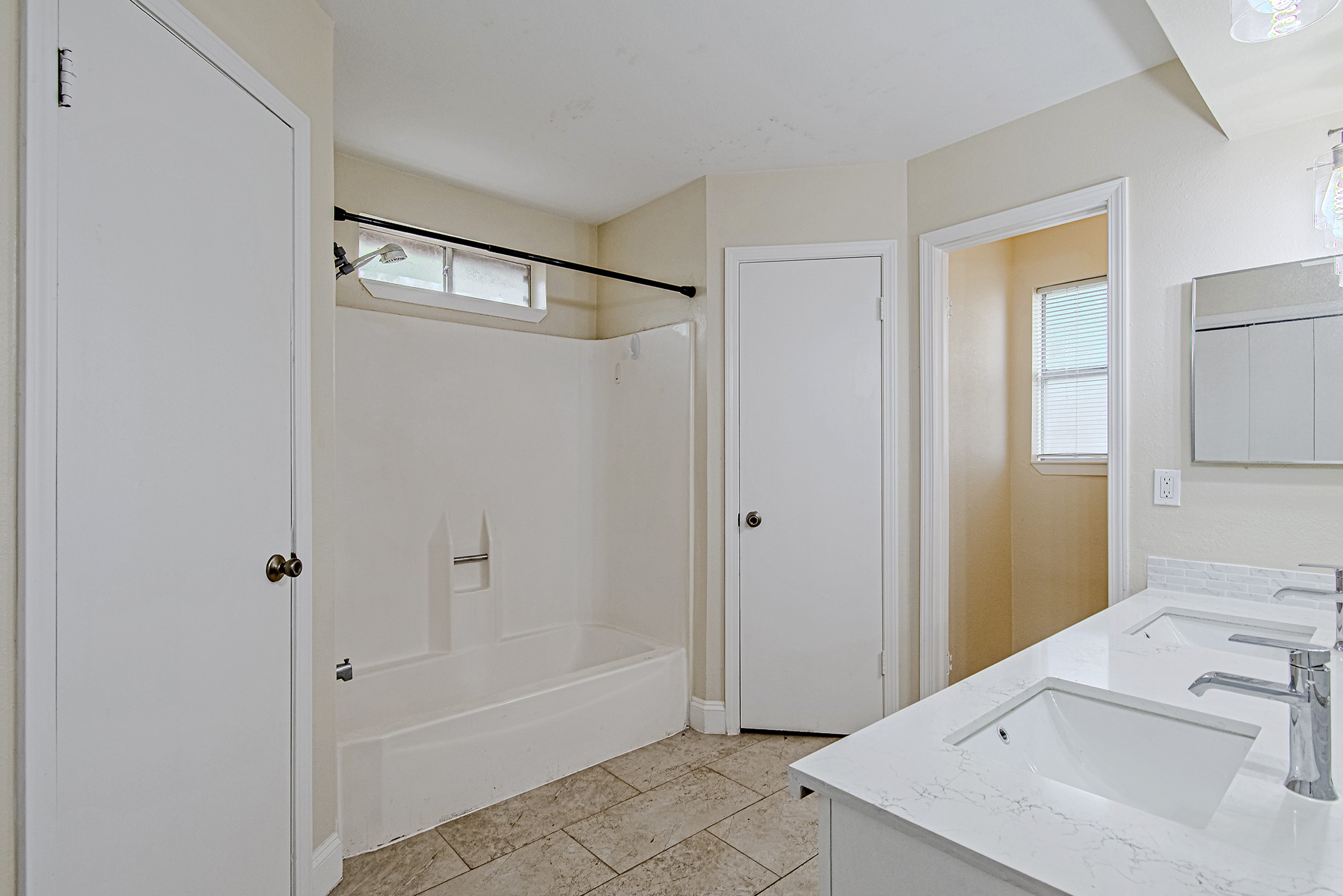 17811 Hawk Haven Lane Spring, TX 77379 - Photo 15 of 22 Primary bathroom featuring dual vanities and a functional layout.