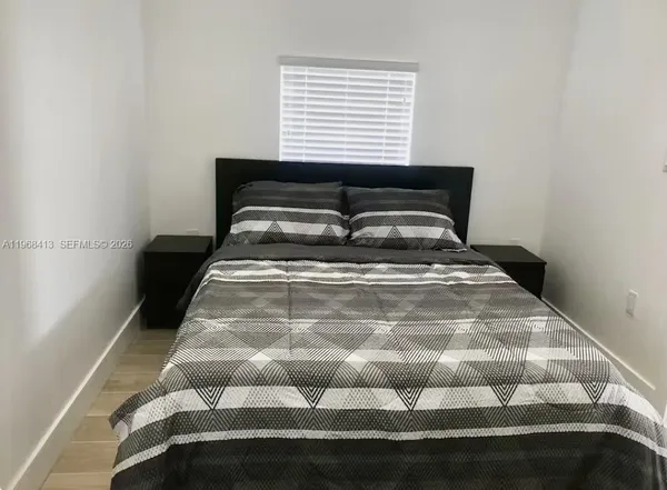 a view of a room with rack on the wall