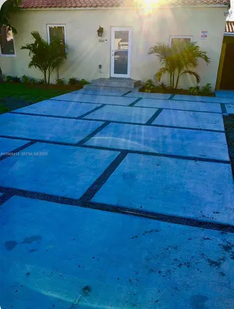 a view of outdoor space and wooden floor