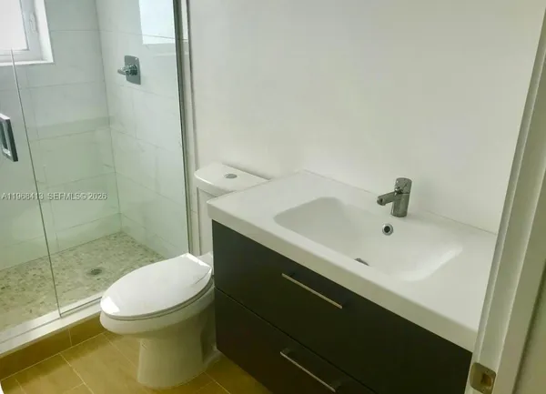 a bathroom with a sink and a toilet