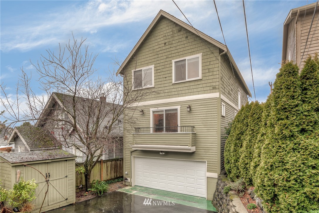 1940 9th Avenue West Seattle, WA 98119 - Photo 24 of 25 a view of a house with a yard