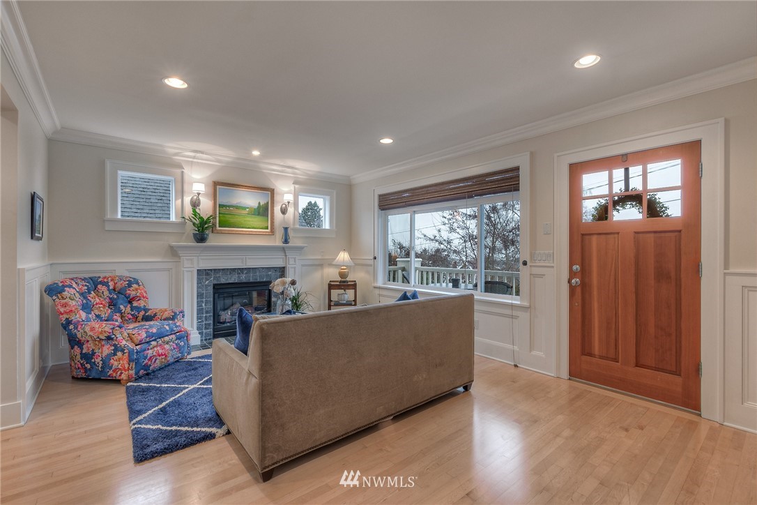 1940 9th Avenue West Seattle, WA 98119 - Photo 5 of 25 a living room with furniture and a fireplace