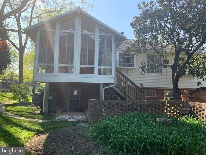 1902 Foxhall Road McLean, VA 22101 - Photo 14 of 15 a view of a house with a yard
