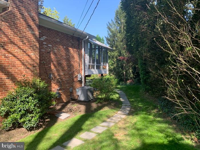 1902 Foxhall Road McLean, VA 22101 - Photo 2 of 15 a view of a house with a yard