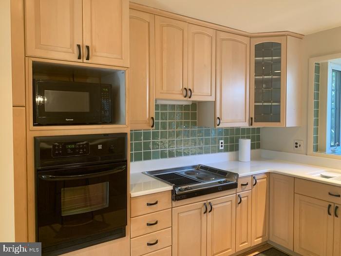 1902 Foxhall Road McLean, VA 22101 - Photo 5 of 15 a kitchen with granite countertop a stove sink and cabinets