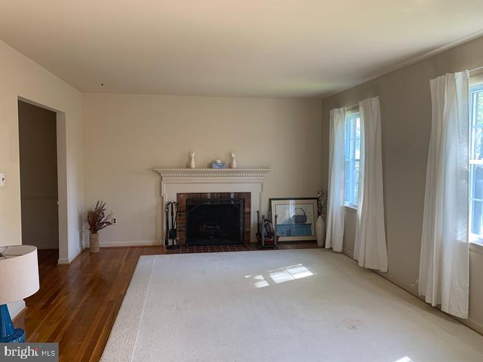 1902 Foxhall Road McLean, VA 22101 - Photo 9 of 15 a view of a livingroom with a fireplace