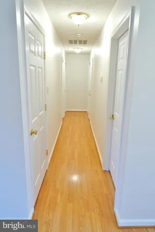 a view of a bathroom with a tub and shower