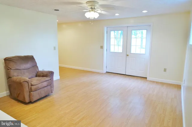 a big yard with lots of green space and plants