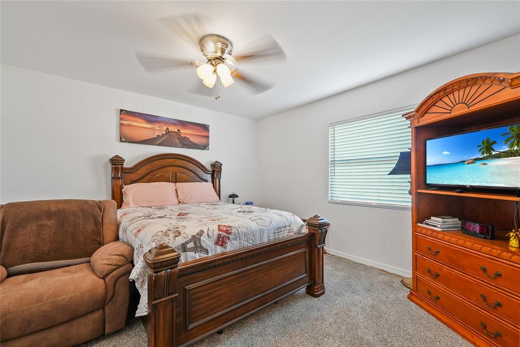 15 Yulee Arcadia, FL 34266 - Photo 13 of 33 a bedroom with a bed and dresser