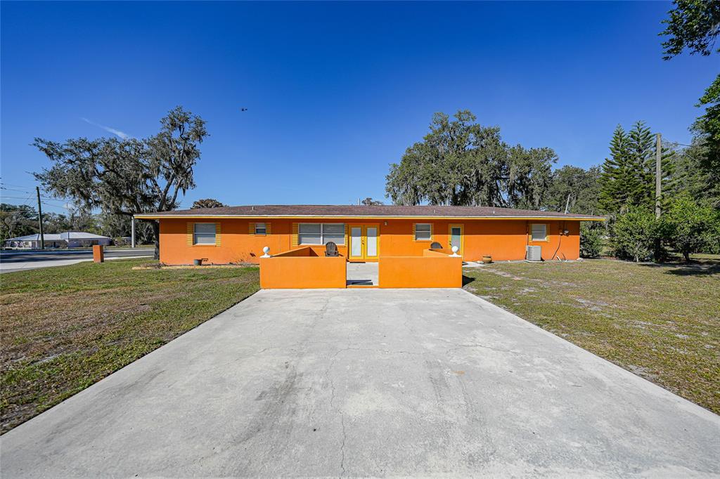 15 Yulee Arcadia, FL 34266 - Photo 30 of 33 a view of a big yard with a large tree