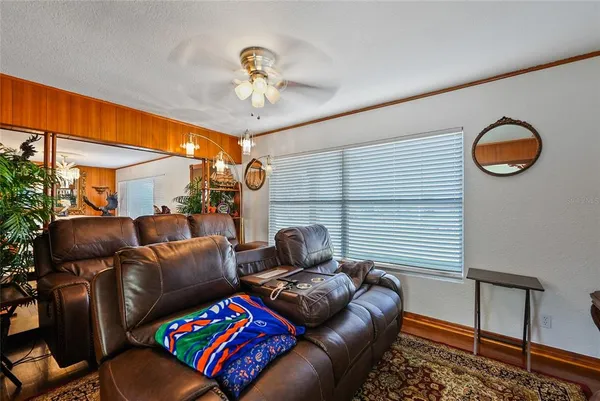 a living room with furniture and a window