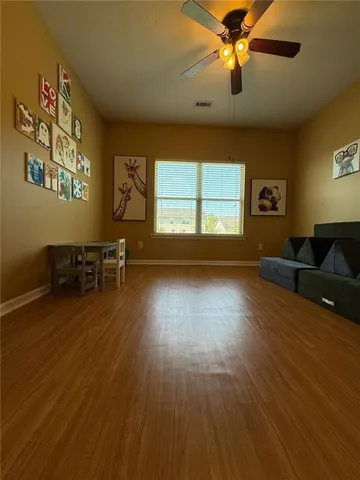 a room with furniture and a window