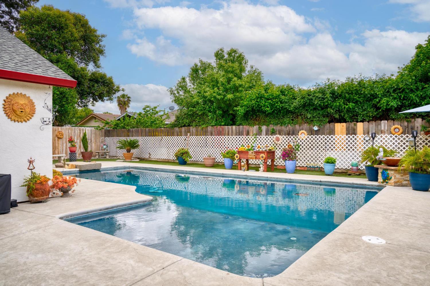 760 Pebble Way Manteca, CA 95336 - Photo 1 of 1 a view of swimming pool with seating space