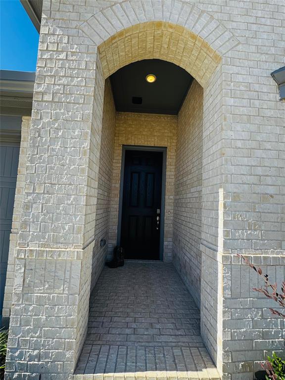 2906 Halcyon Street Princeton, TX 75407 - Photo 2 of 11 a front view of a house with a entrance