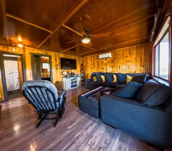 a living room with furniture and a table