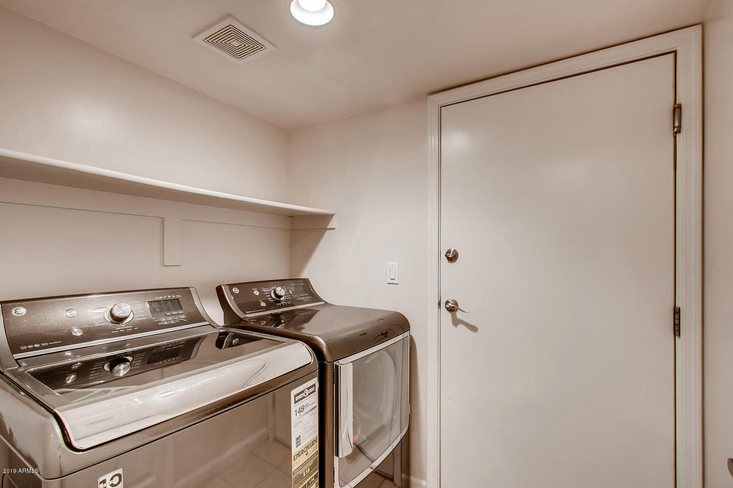 1920 East Bell Road, Unit 1036 Phoenix, AZ 85022 - Photo 14 of 21 Laundry Room & Garage Entrance