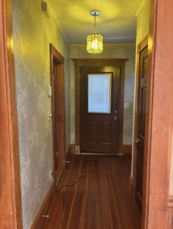 13 Moulton Street Lynn, MA 01905 - Photo 10 of 18 a view of a hallway with wooden floor