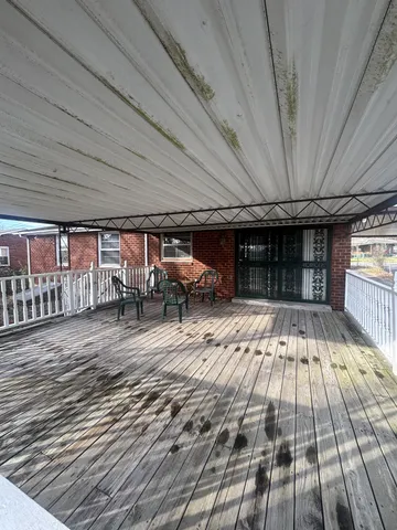 a view of pool with sitting area