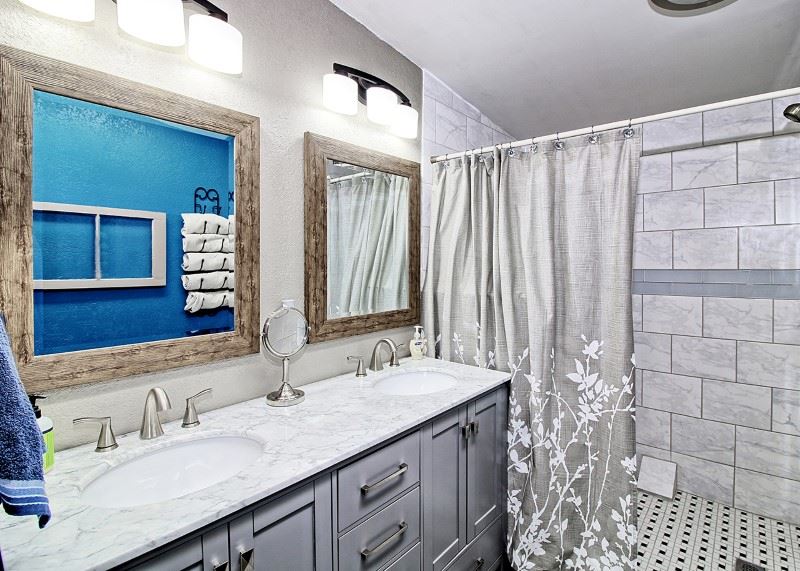 796 Siminoe Road Whitewater, CO 81527 - Photo 14 of 37 a bathroom with a granite countertop sink and a mirror