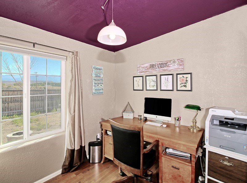 796 Siminoe Road Whitewater, CO 81527 - Photo 21 of 37 a view of a workspace with furniture and a window