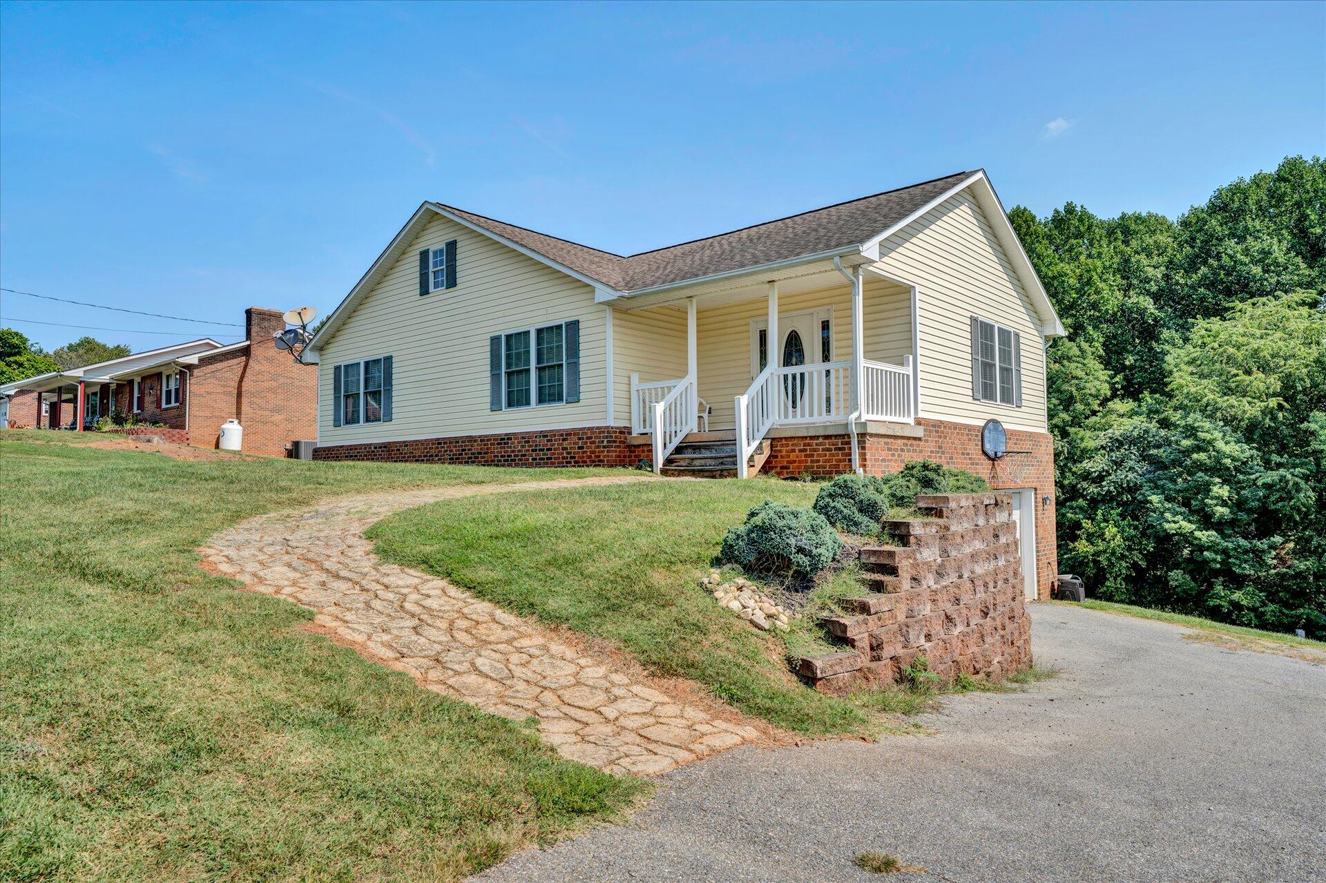 front view of a house with a yard