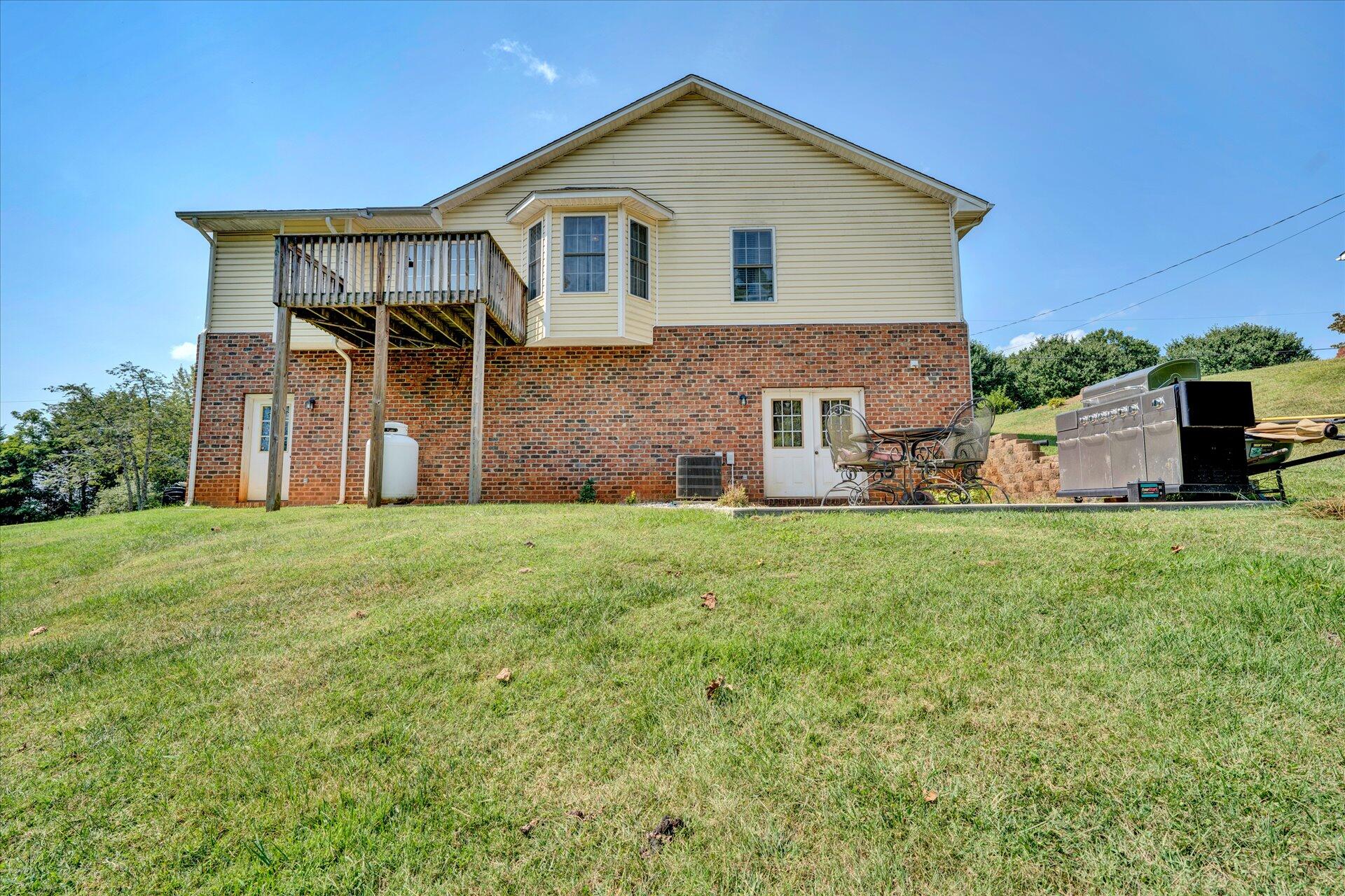 130 Highfield Road Rocky Mount, VA 24151 - Photo 23 of 23 a front view of a house with a yard