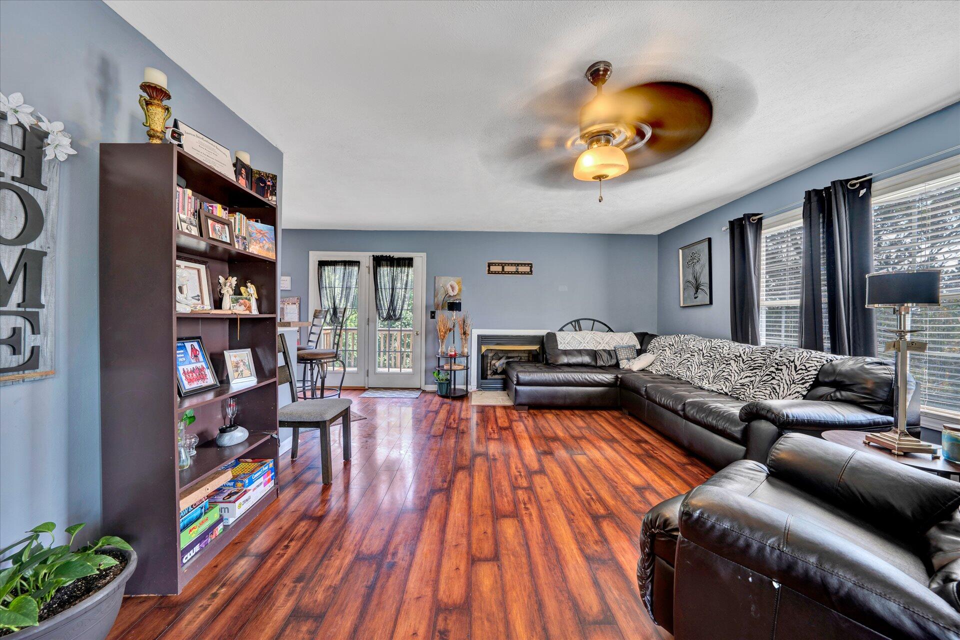130 Highfield Road Rocky Mount, VA 24151 - Photo 4 of 23 a living room with furniture and a wooden floor