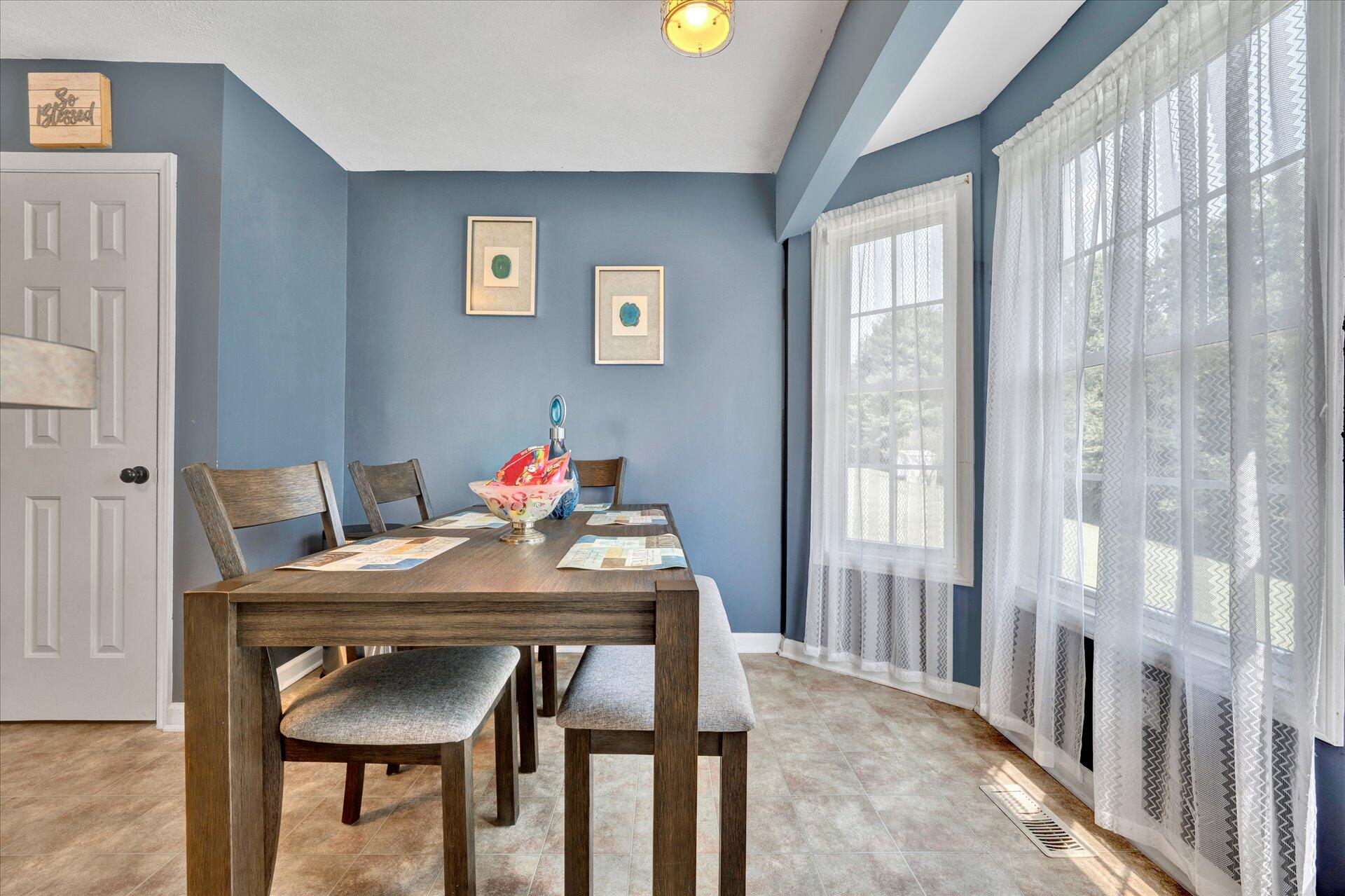130 Highfield Road Rocky Mount, VA 24151 - Photo 7 of 23 a view of a dining room with furniture and a window