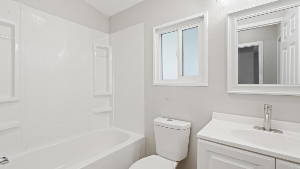 13490 Highway 8 Business, Unit 8 Lakeside, CA 92040 - Photo 13 of 29 a bathroom with a sink toilet and shower