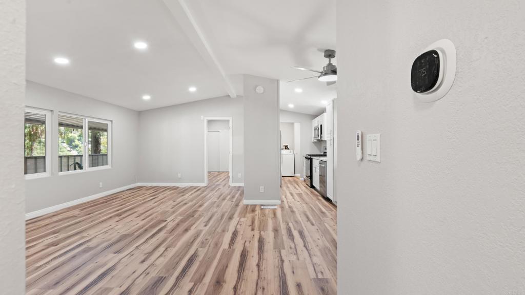 13490 Highway 8 Business, Unit 8 Lakeside, CA 92040 - Photo 16 of 29 a view of a room with wooden floor and windows