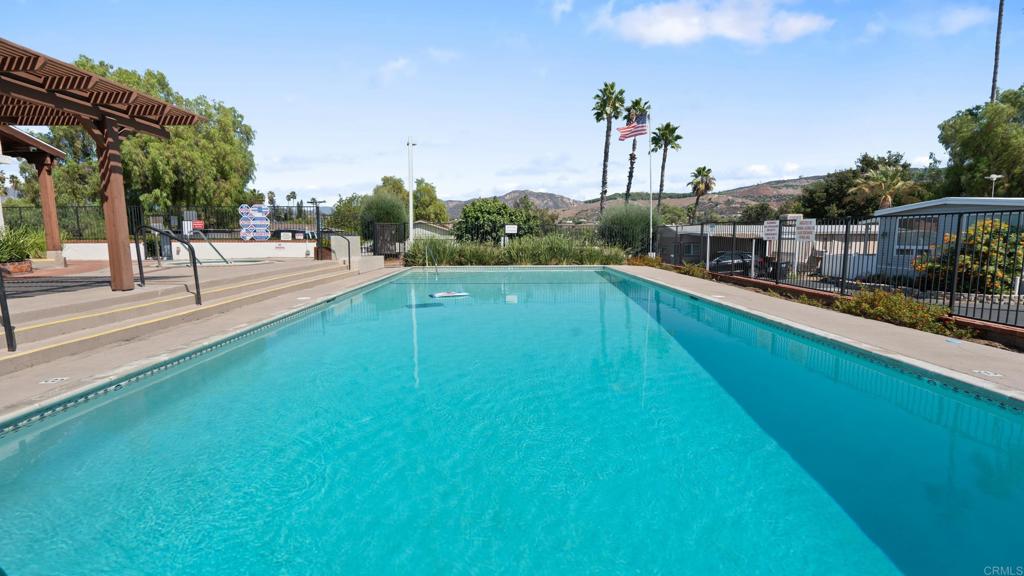 13490 Highway 8 Business, Unit 8 Lakeside, CA 92040 - Photo 28 of 29 a view of a swimming pool with a patio