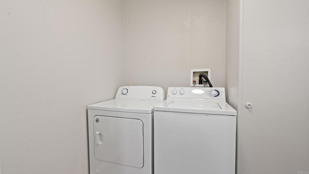 13490 Highway 8 Business, Unit 8 Lakeside, CA 92040 - Photo 8 of 29 a utility room with dryer and washer