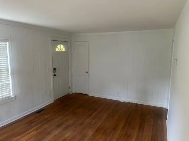 an empty room with window