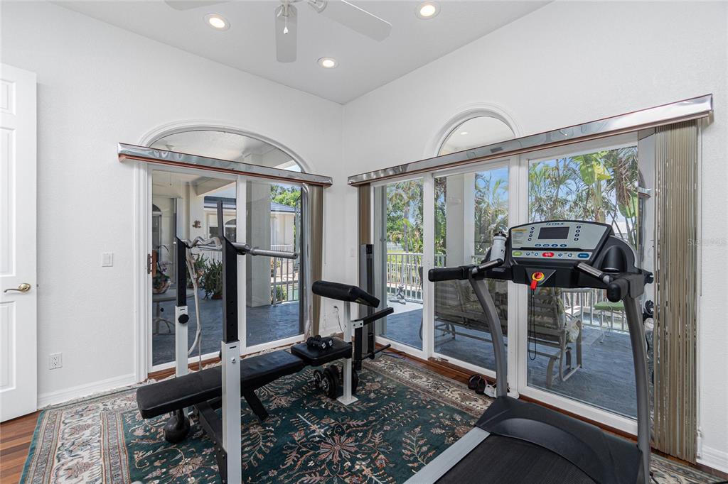 202 George Road Southeast Port Charlotte, FL 33952 - Photo 16 of 100 a view of a room with gym equipment