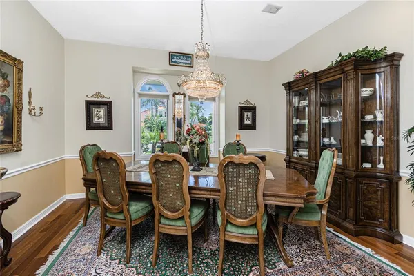 a kitchen with stainless steel appliances granite countertop sink stove and refrigerator