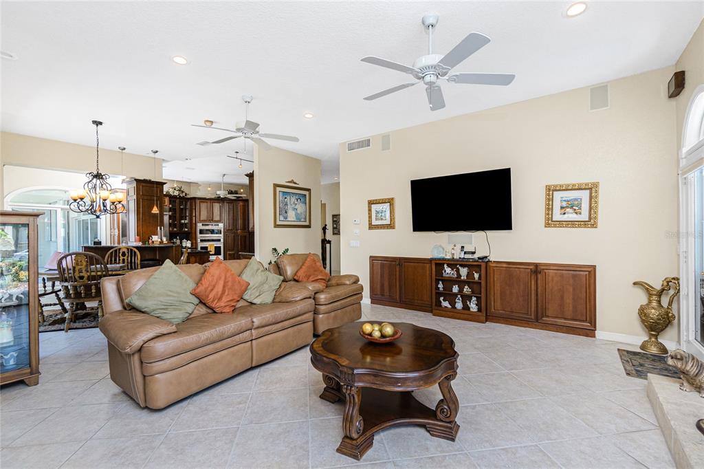 202 George Road Southeast Port Charlotte, FL 33952 - Photo 26 of 100 a living room with furniture and a flat screen tv