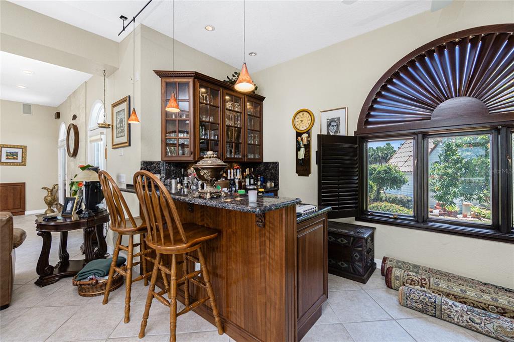 202 George Road Southeast Port Charlotte, FL 33952 - Photo 28 of 100 a view of a dining room with furniture window and outside view