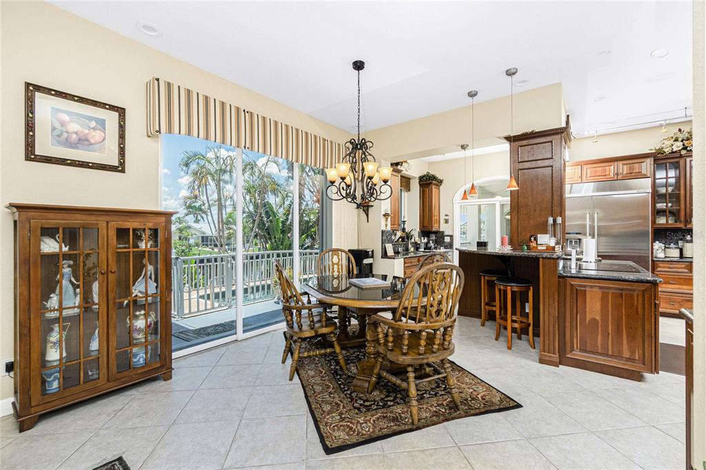 202 George Road Southeast Port Charlotte, FL 33952 - Photo 32 of 100 a view of a dining room with furniture window and outside view