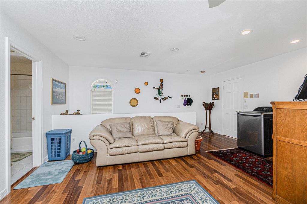 202 George Road Southeast Port Charlotte, FL 33952 - Photo 61 of 100 a living room with furniture and a rug