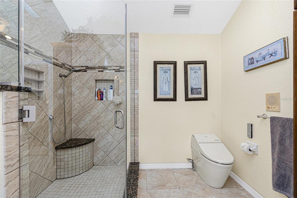 202 George Road Southeast Port Charlotte, FL 33952 - Photo 75 of 100 a bathroom with a toilet and a shower