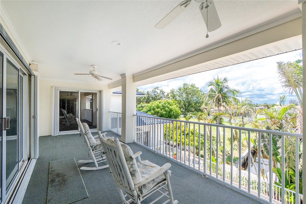 202 George Road Southeast Port Charlotte, FL 33952 - Photo 79 of 100 a view of a two chair in the balcony