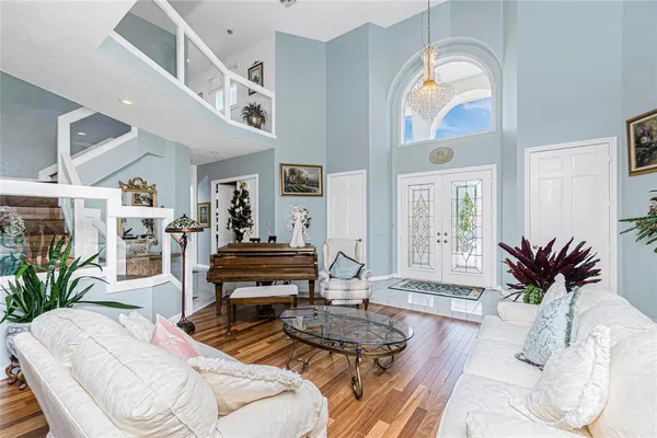 a view of a room with lots of wooden furniture