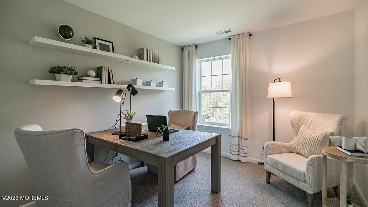 48 East 3rd Street Howell, NJ 07731 - Photo 16 of 20 a view of a workspace with furniture and a window