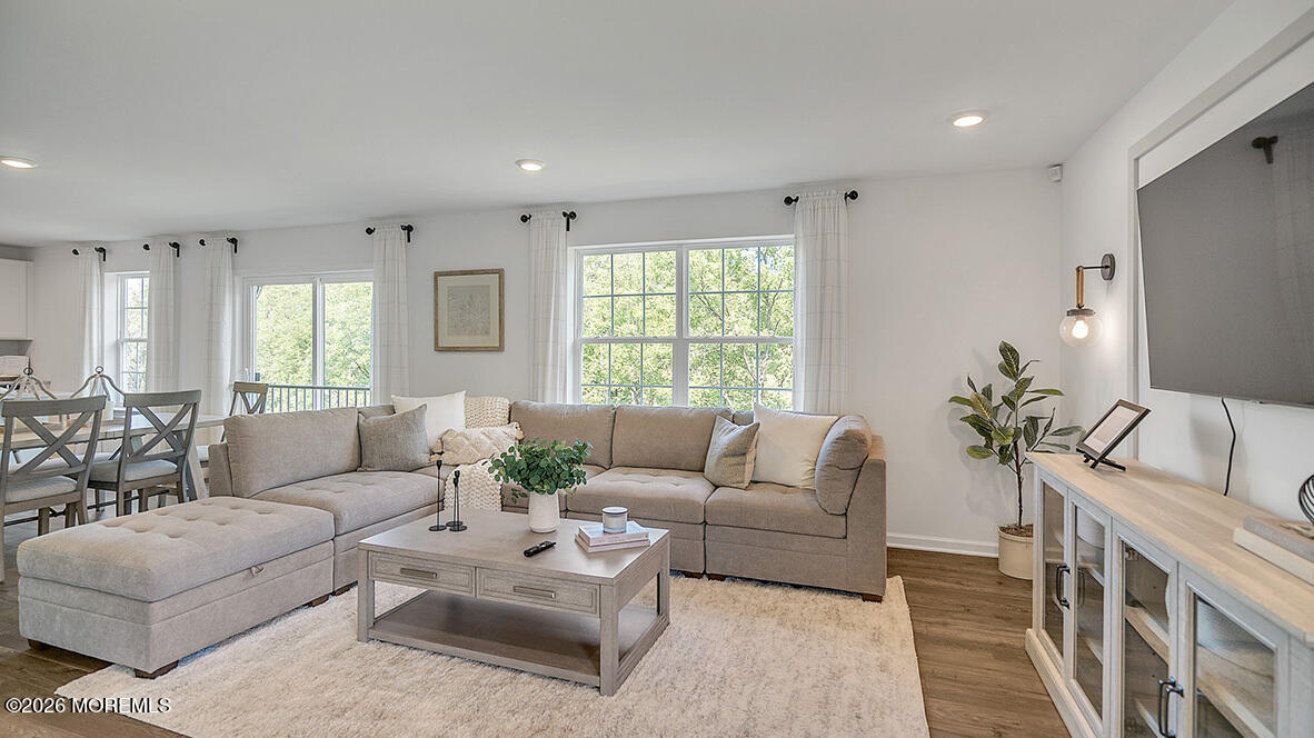 48 East 3rd Street Howell, NJ 07731 - Photo 2 of 20 a living room with furniture and a large window