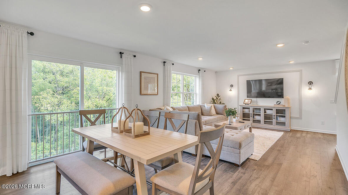 48 East 3rd Street Howell, NJ 07731 - Photo 6 of 20 a view of a dining room with furniture window and wooden floor