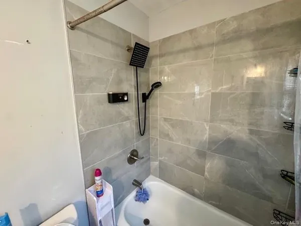 a bathroom with a sink and a shower