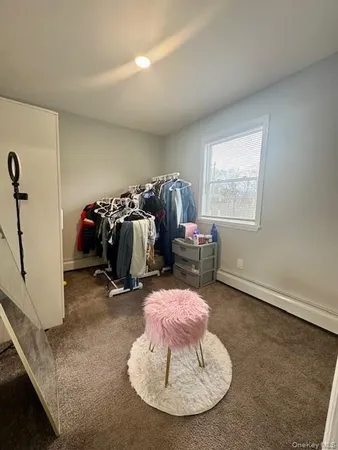a view of a livingroom with furniture