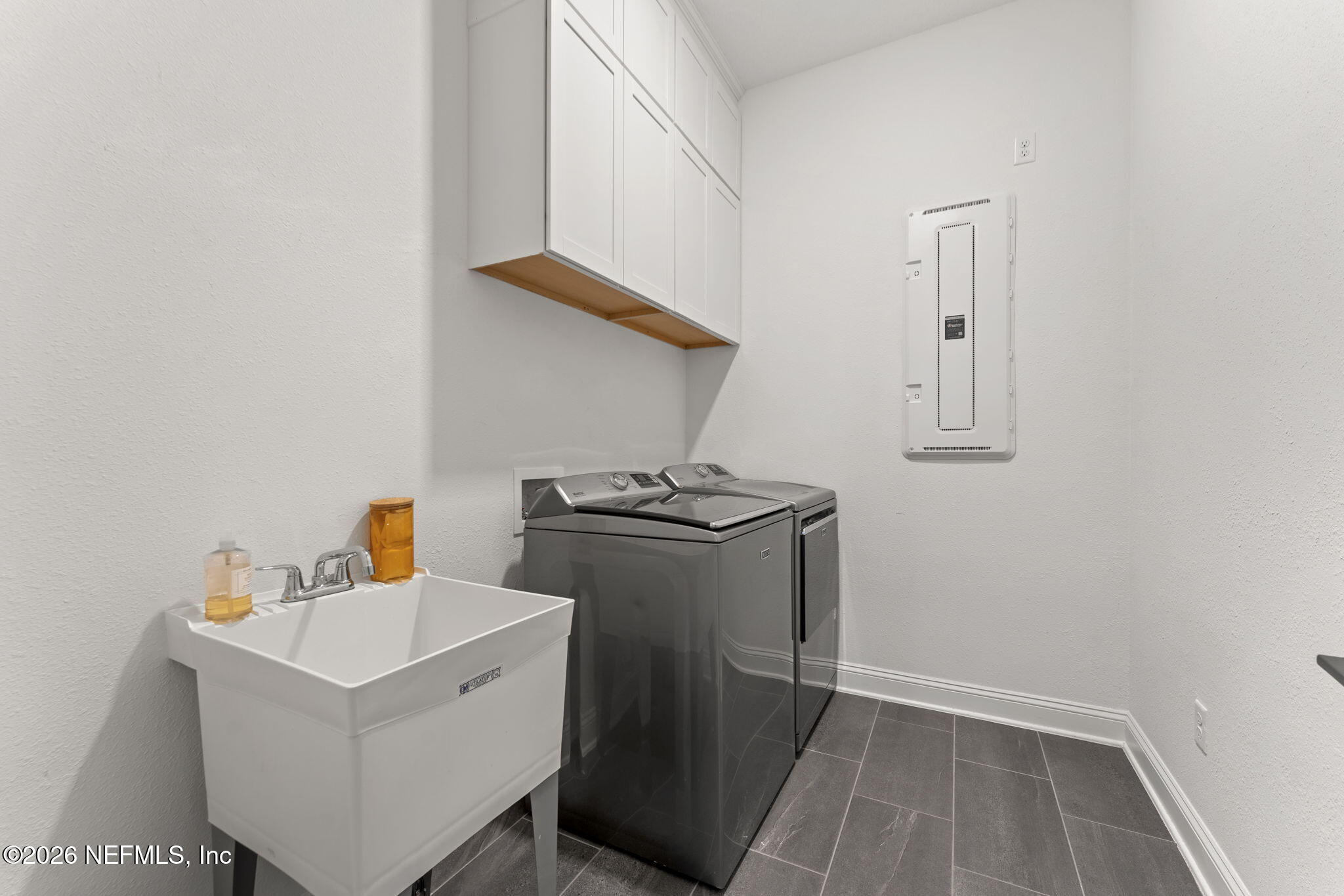 101 Elm Br Road St. Johns, FL 32259 - Photo 43 of 77 a utility room with sink dryer and washer
